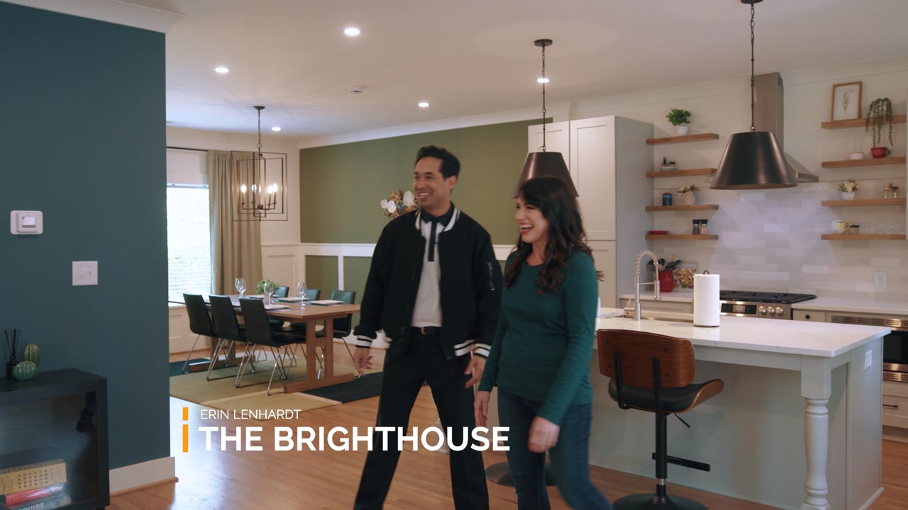Erin Lenhardt of The Brighthouse with the Staycation Sports host in the kitchen of the Charlotte group home